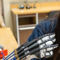 Lauren Gan with exoskeleton glove