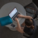 Overhead view of a person working on a laptop