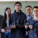 SF State faculty with some of the student researchers holding their bonic arm and Sony microprocessor.