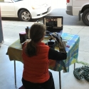 Professor Snider demonstrates a film processing technique in her garage 