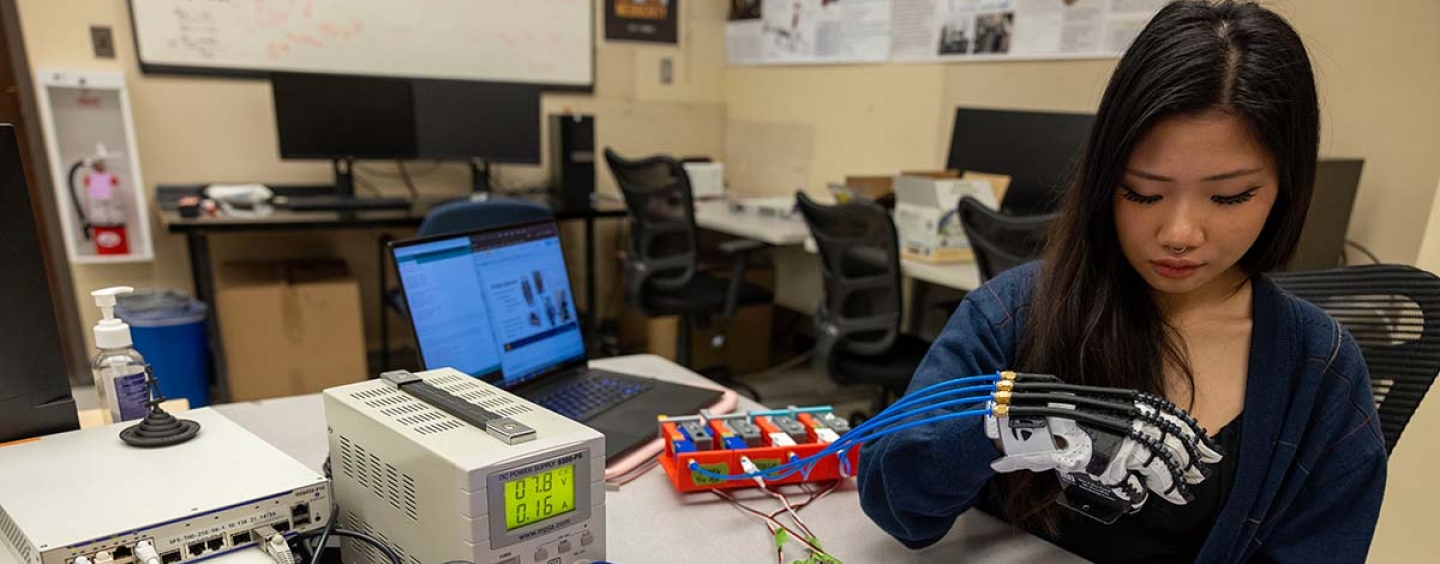 Student working on bionic hand project in Quintero lab