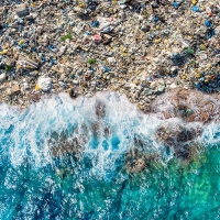 plastic waste on ocean shore