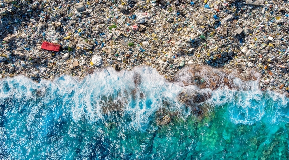 plastic waste on ocean shore